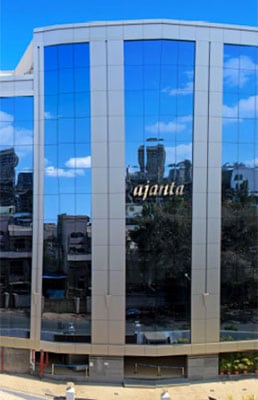 Building with glass reflective windows.